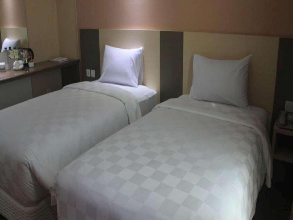 Dalton Hotel Makassar Buitenkant foto