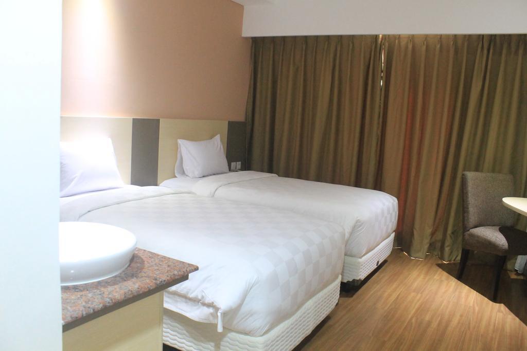Dalton Hotel Makassar Kamer foto
